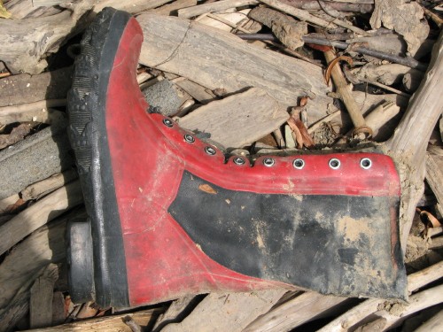 tall red and black boot